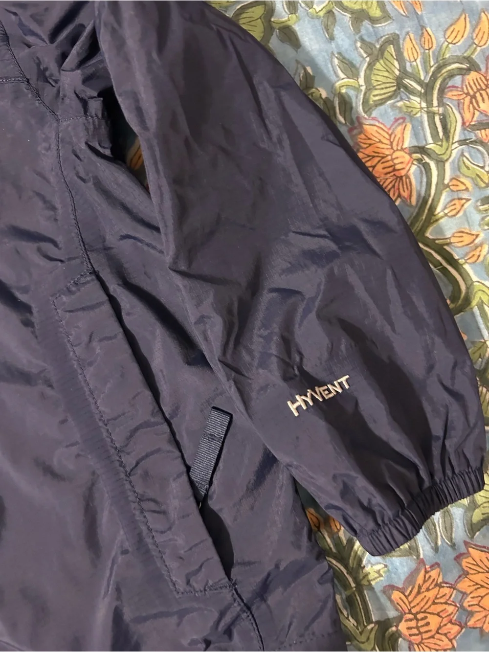 The North Face Kids' Hooded Raincoat - Navy Exterior with Red Lining